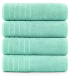 Extra-large bath sheet measuring 85 x 165 cm displayed on a bed