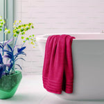 Super-soft cotton bath sheet towels in a bathroom setting