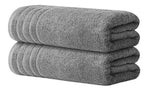 Soft cotton towels stacked in a luxury bathroom